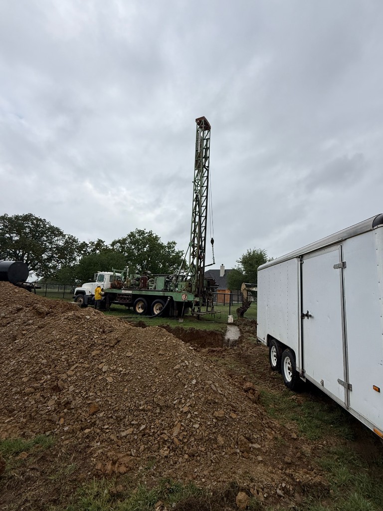 Reliant Drilling water well rig on a Central Texas job site