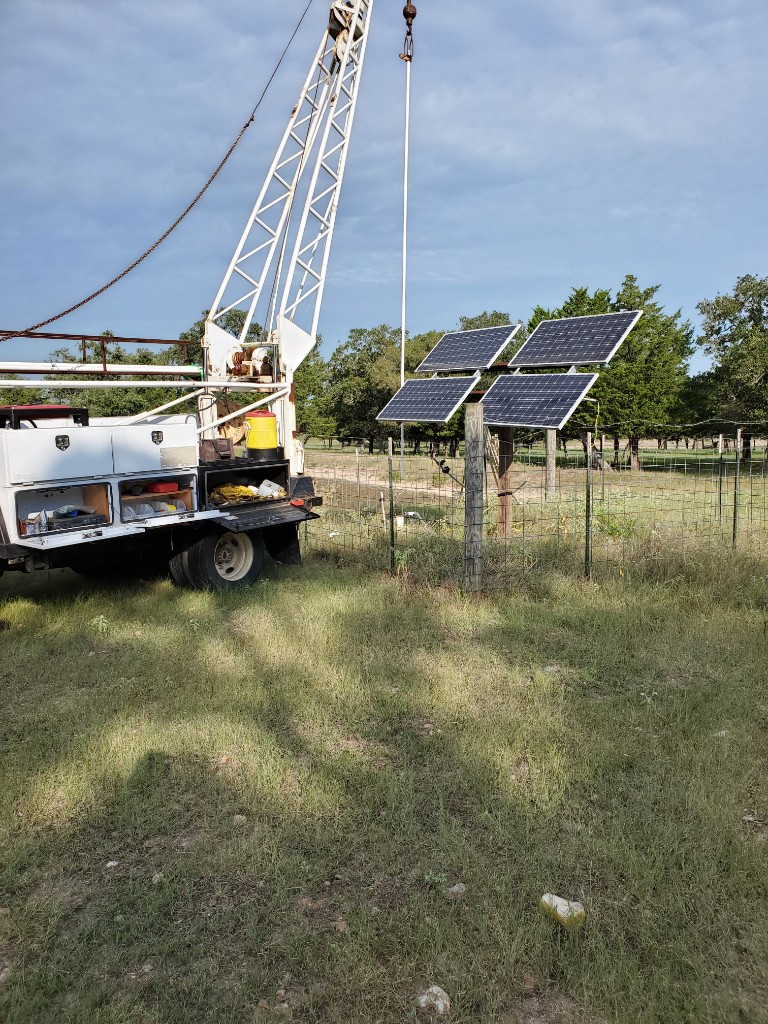 Service truck at a solar-powered water well